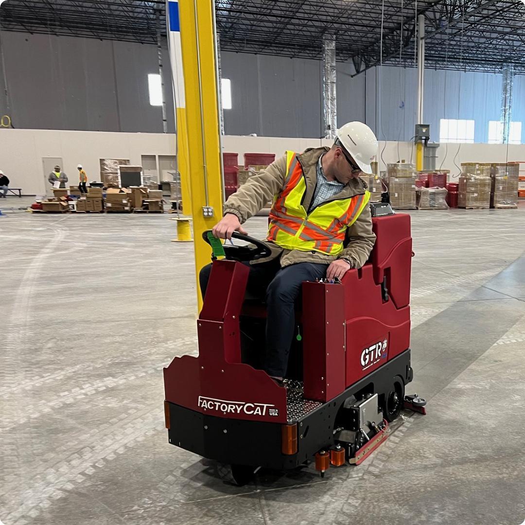 FactoryCat Ride On Floor Scrubbers GTR warehouse concrete - https://assets.factorycat.com/demoImages/2024/july/factorycat-ride on floor scrubbers-gtr-warehouse-concrete-100.jpg - 1080 - 1080 - 100 GTR Ride On Floor Scrubbers Kansas Logistics