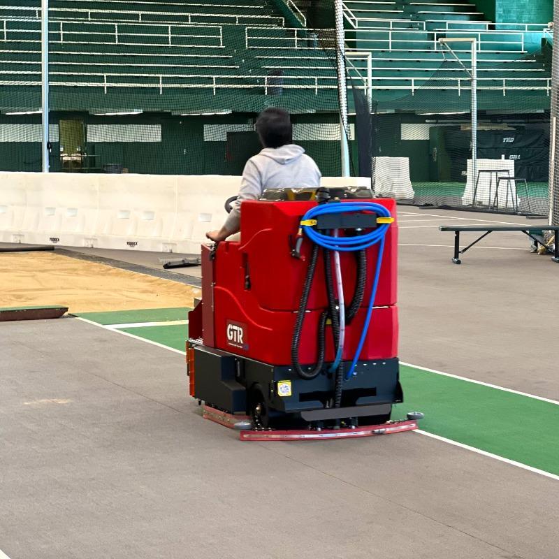 FactoryCat Ride On Floor Scrubbers GTR field house sports floors - https://assets.factorycat.com/demoImages/2025/april/GTR-Ride On Floor Scrubbers-field house-sports floors-Columbus-USA-318.jpg - 800 - 800 - 318 A FactoryCat GTR battery powered rider floor scrubber cleans the sports floor in a field house in Columbus OH.