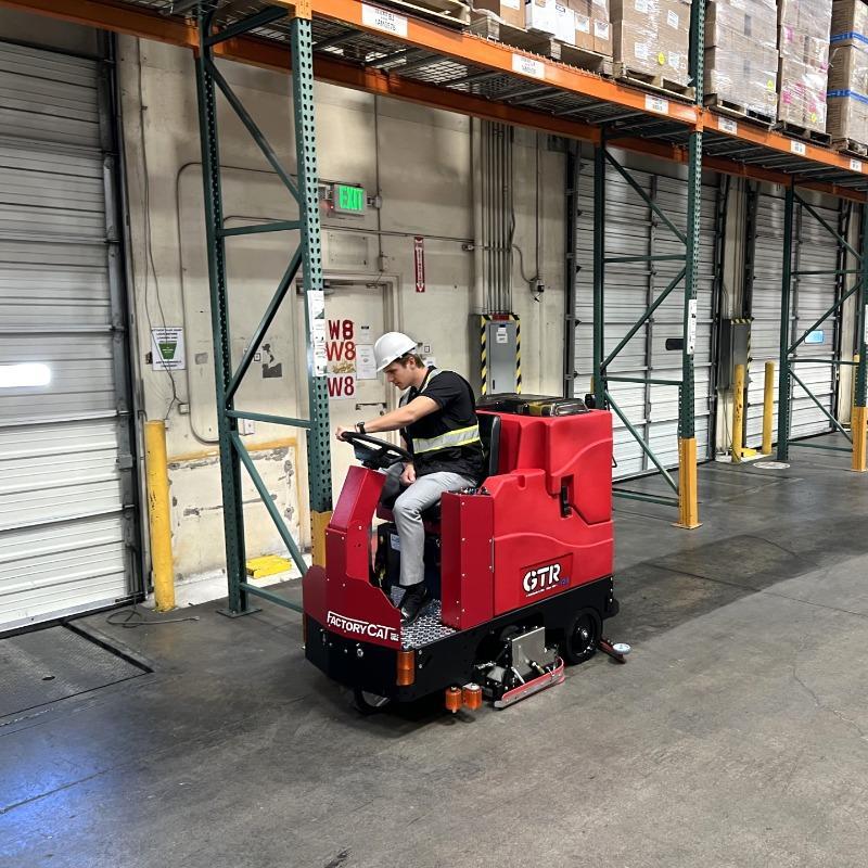 FactoryCat Ride On Floor Scrubbers GTR loading dock concrete - https://assets.factorycat.com/demoImages/2025/april/GTR-Ride On Floor Scrubbers-loading dock-concrete-Houston-USA-633.jpg - 800 - 800 - 633 GTR Ride On Floor Scrubbers cleans a Houston, Texas 3PL provider.