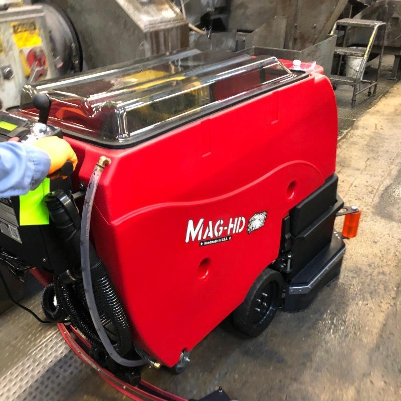 FactoryCat Walk Behind Floor Scrubbers Mag-HD boiler room concrete - https://assets.factorycat.com/demoImages/2025/april/Mag-HD-Walk Behind Floor Scrubbers-boiler room-concrete-Philadelphia-USA-800.jpg - 800 - 800 - 800 FactoryCat Mag-HD Walk Behind Floor Scrubber cleans the concrete floor on a boiler room in as Philadelphia, Pennsylvania factory