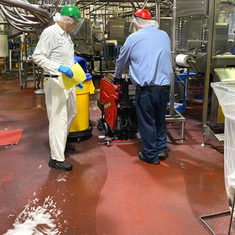 FactoryCat Walk Behind Floor Scrubbers Micro-HD production floor epoxy - https://assets.factorycat.com/demoImages/2025/april/Micro-HD-Walk Behind Floor Scrubbers-production floor-epoxy-Baltimore-USA-342.jpg - 800 - 800 - 342 A FactoryCat Micro-HD battery floor scrubber cleaning the epoxy production floor of a bakery in Baltimore, Maryland.