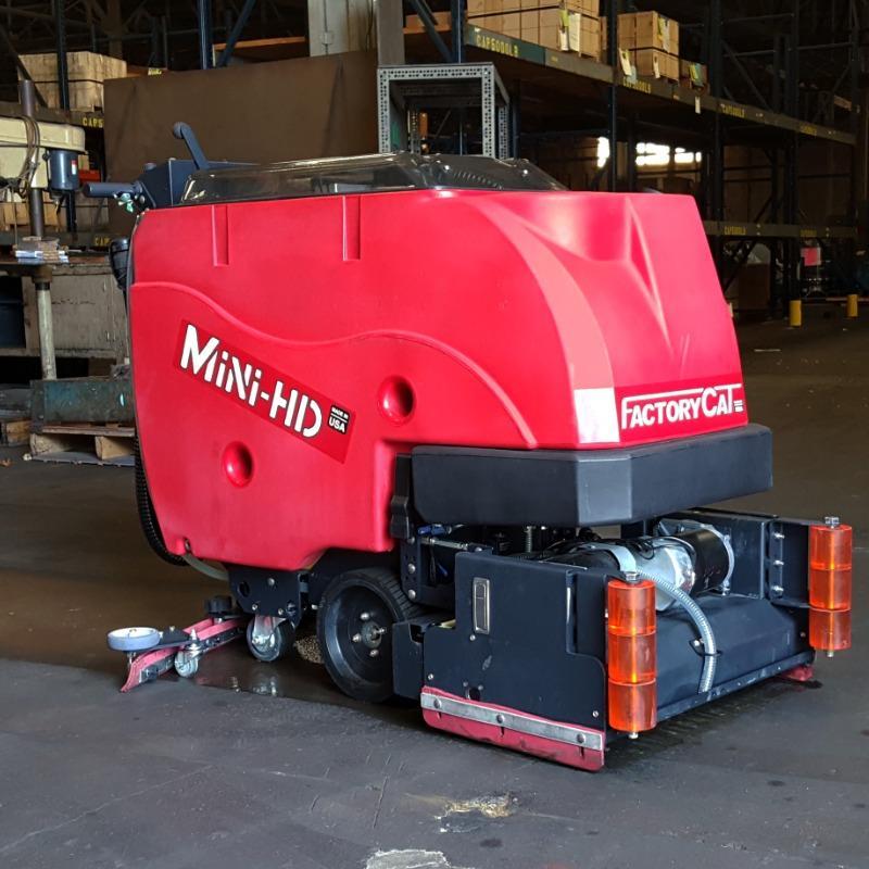 FactoryCat Walk Behind Floor Scrubbers Mini-HD warehouse concrete - https://assets.factorycat.com/demoImages/2025/april/Mini-HD-Walk Behind Floor Scrubbers-warehouse-concrete-Pittsburg-USA-552.jpg - 800 - 800 - 552 FactoryCat Mini-HD Walk Behind Floor Scrubbers cleans the concrete warehouse floor at a foundry in Pennsylvania